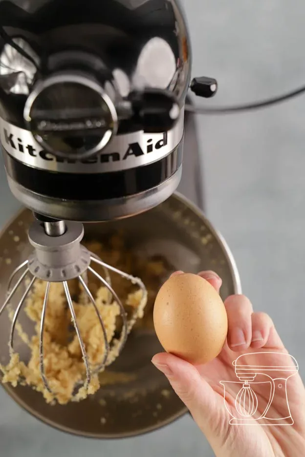 Egg is added to the mixing bowl
