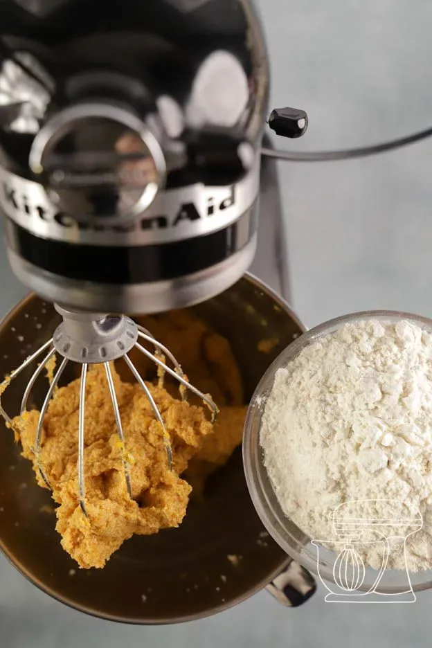 Flour is added to the mixing bowl