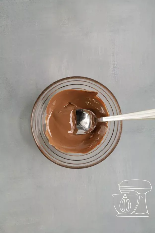 Melted chocolate being stirred smooth
