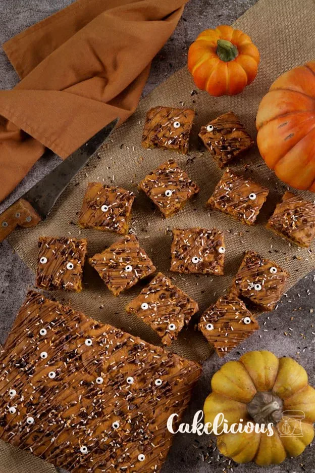 Moist pumpkin brownies with chocolate chips and Halloween decoration
