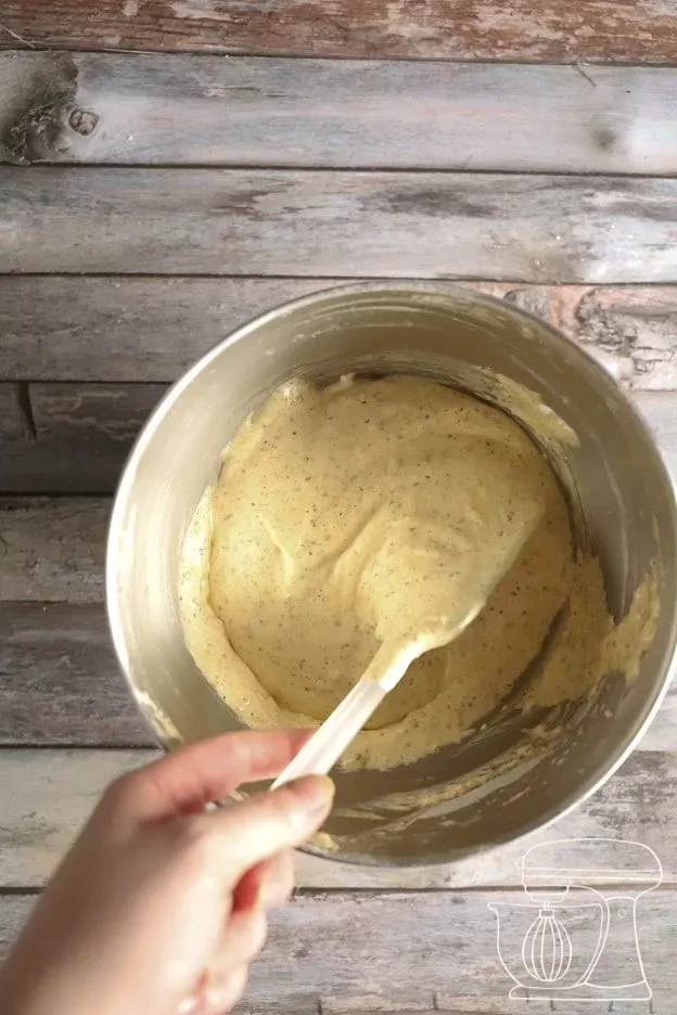 Sponge mixture is gently folded in with the Dough scraper