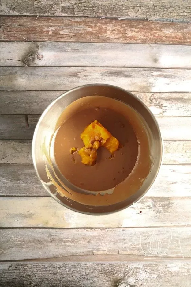 Pumpkin purée being stirred in with the Whisk