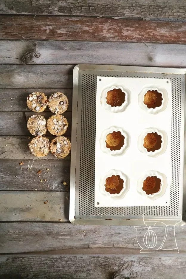 Small sponge discs being pressed into the mousse