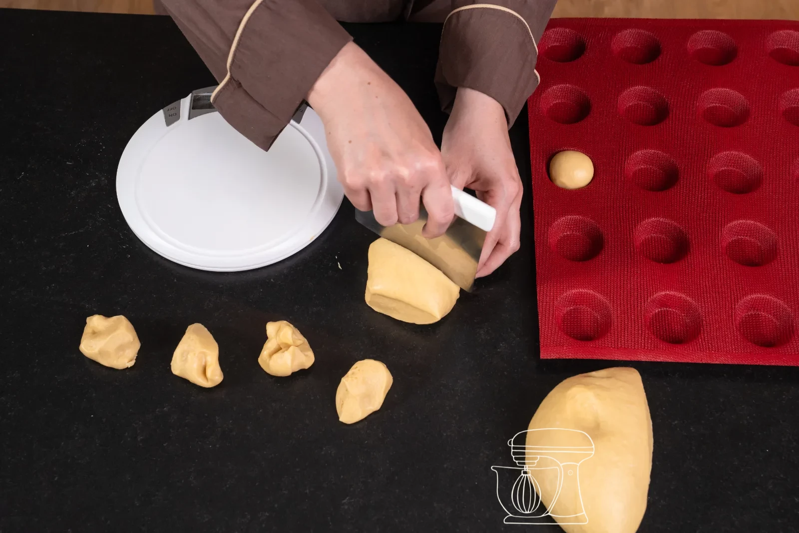 Mini salmon roll – Brioche with horseradish cream and smoked salmon – weigh the dough and shape into balls
