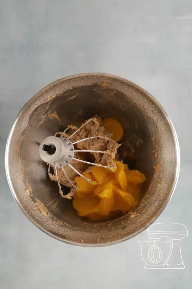 Pumpkin purée being added to the Mixing bowl