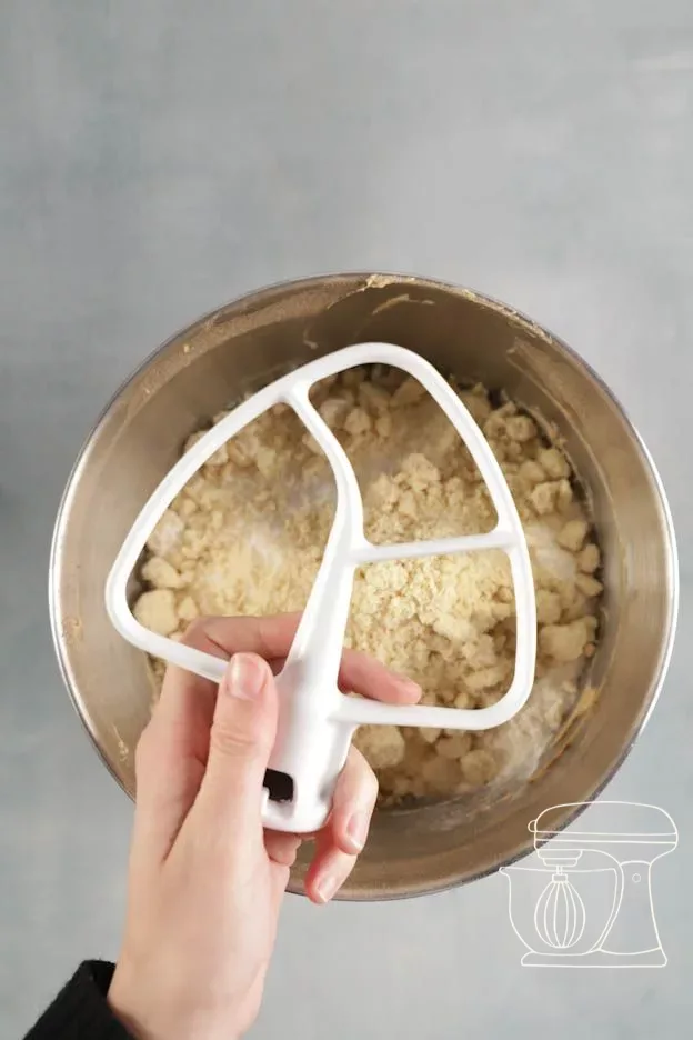 Batter being mixed with the flat beater