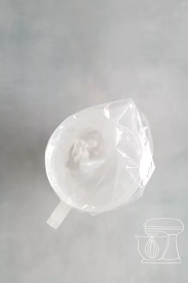 Compact dough is filled into a large piping bag