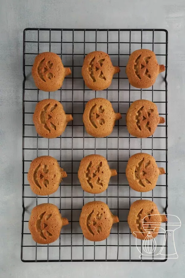 Cooled pumpkin cakes are released from the mold