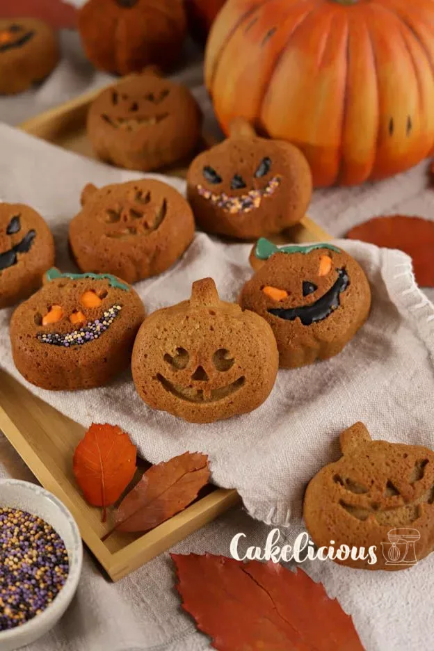 Mini pumpkin cakes with maple Syrup, colourfully decorated with Chocolate flavour pens