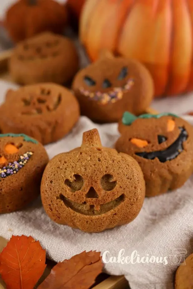 Mini pumpkin cakes with maple Syrup, colourfully decorated with Chocolate flavour pens