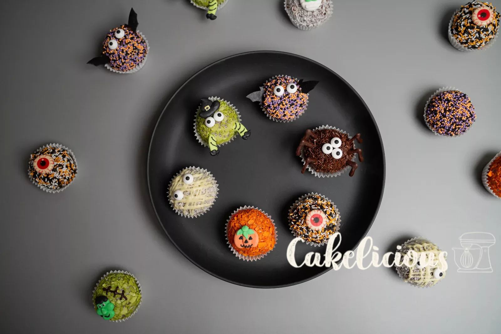 Monster balls on a black plate