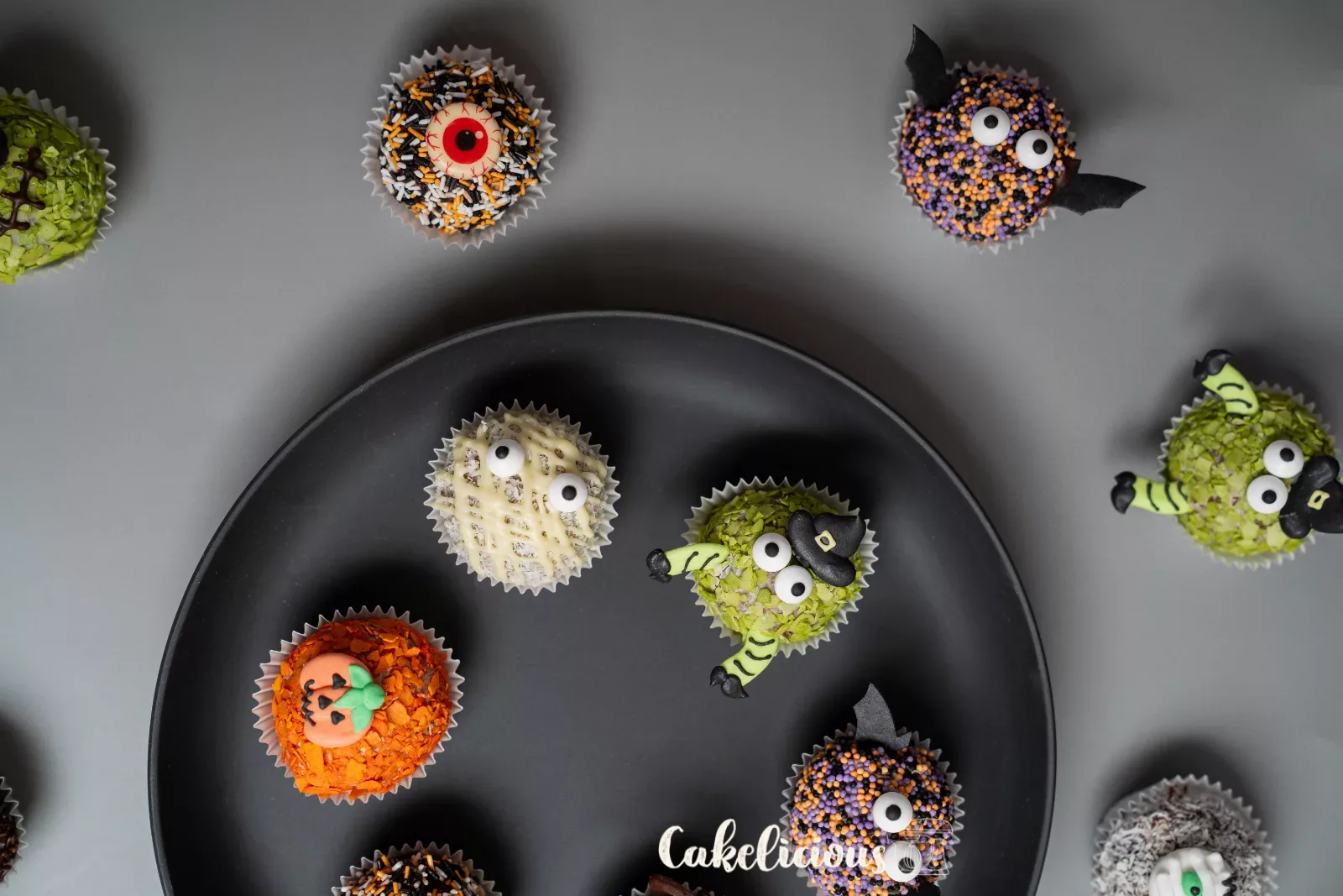 Spider, mummy, pumpkin and witch made from cake balls