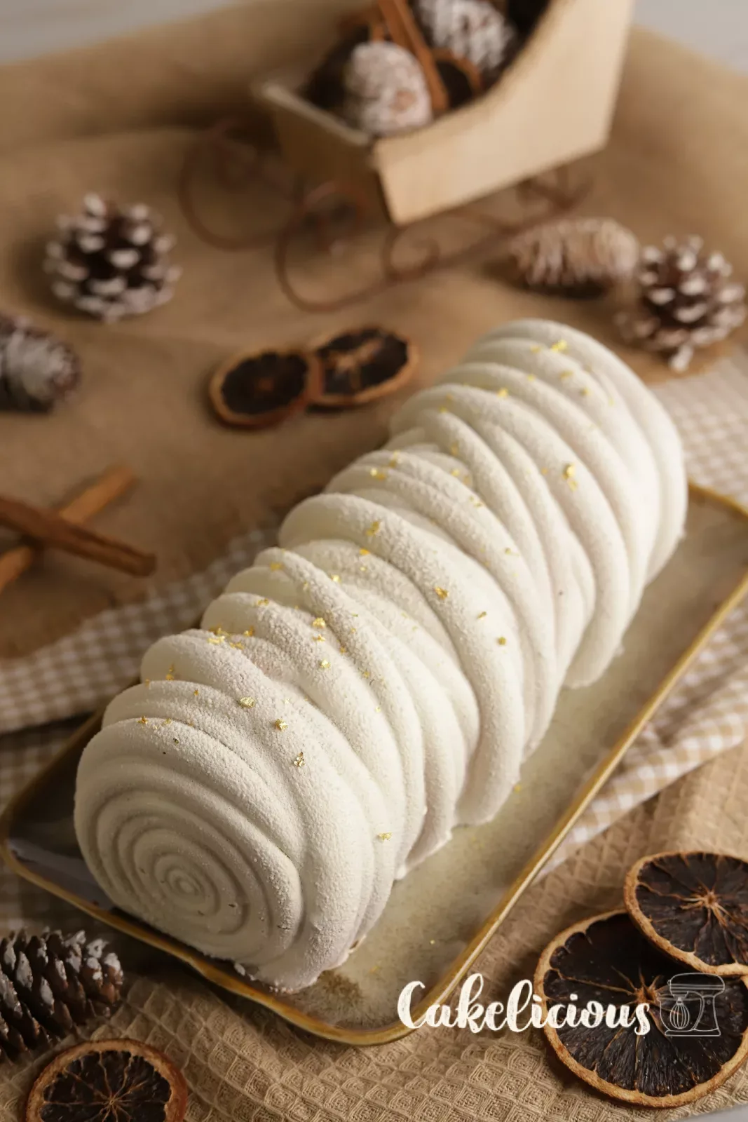 Bûche intera dallo stampo Lana con spray velluto bianco