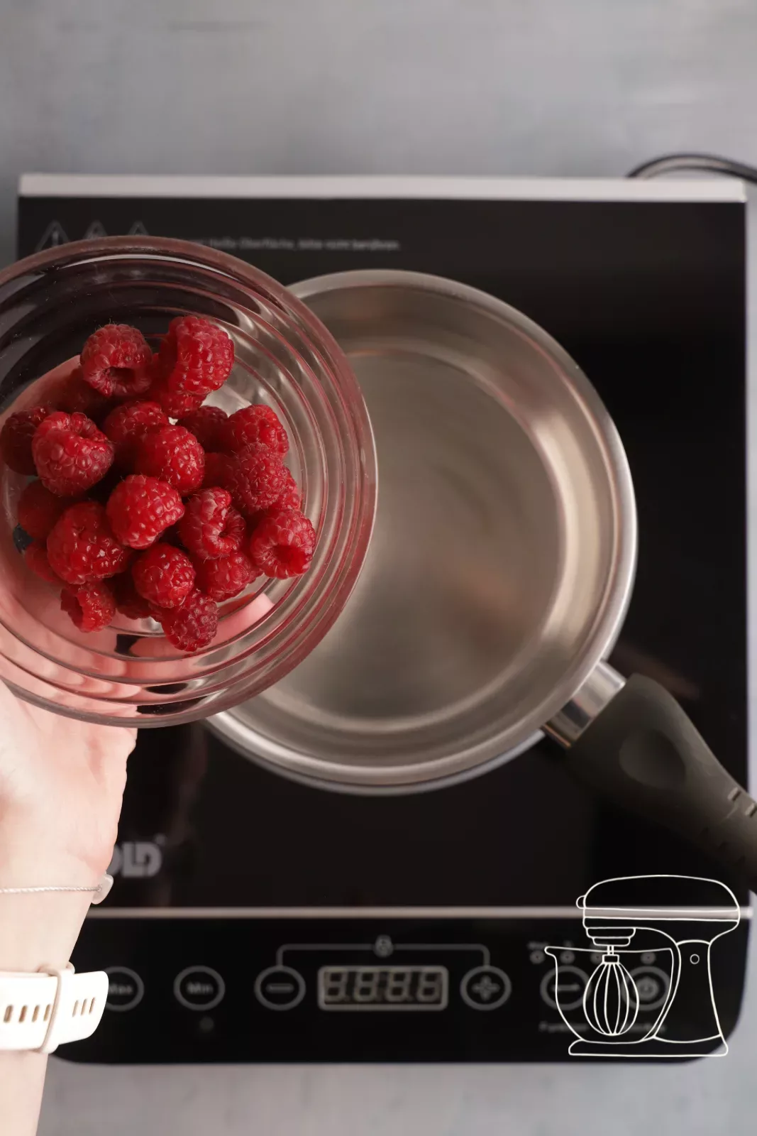 Adding raspberries to the pan