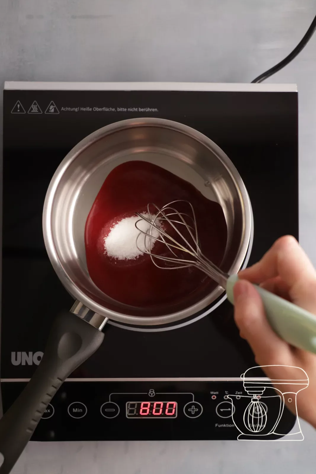 Bringing the purée and sugar to the boil