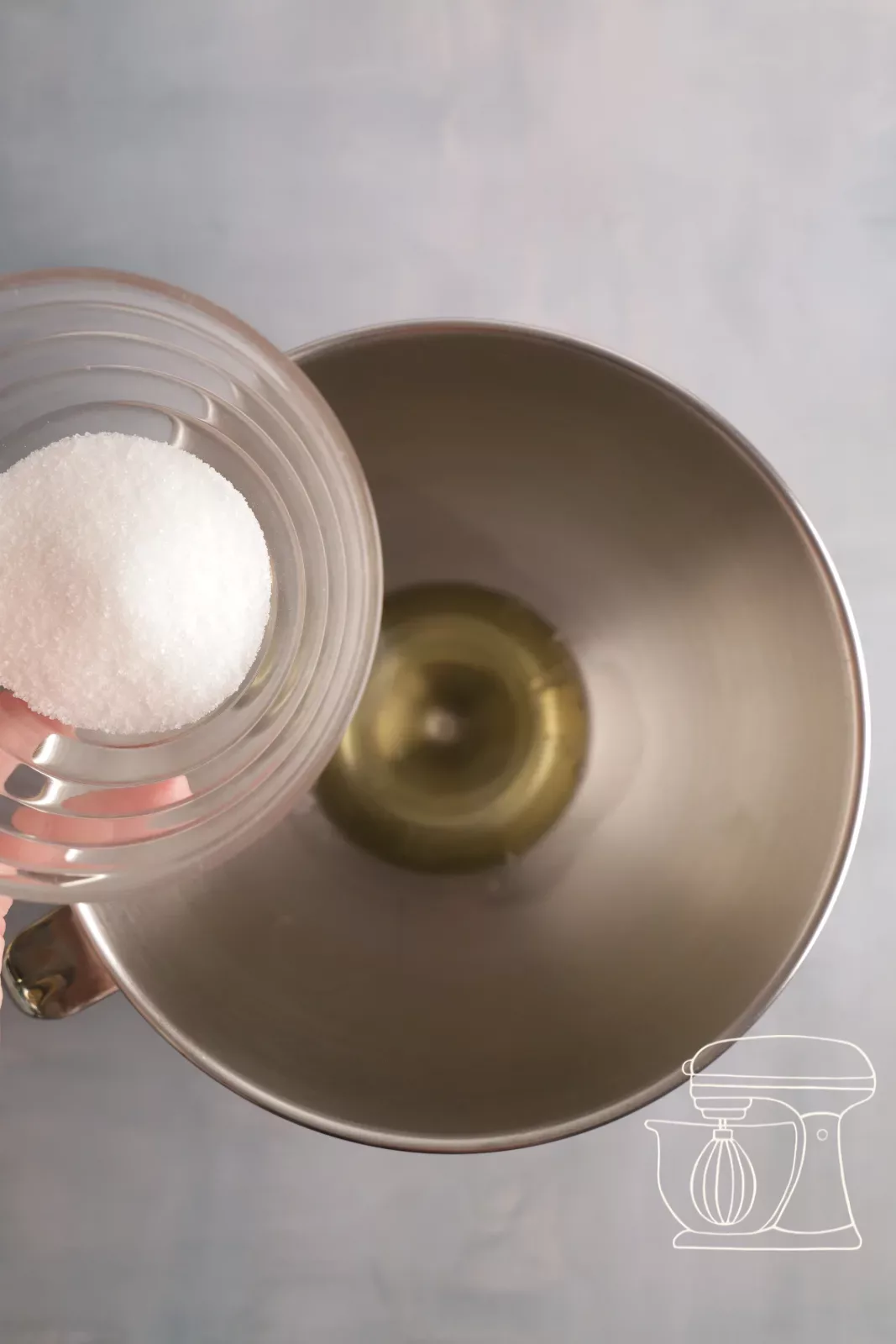Adding sugar to the egg whites