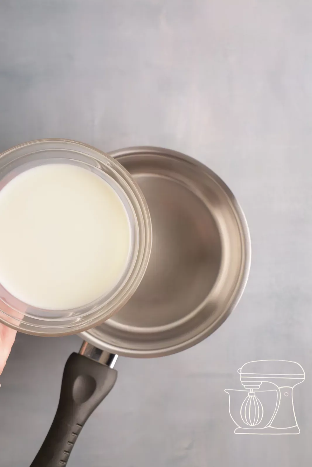 Pouring milk into the saucepan