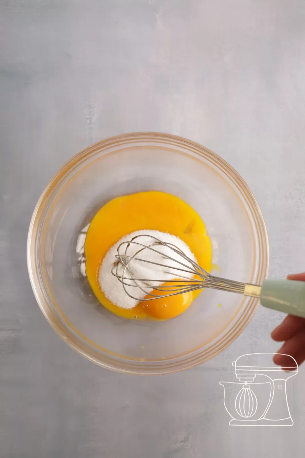 Stirring egg yolks and sugar