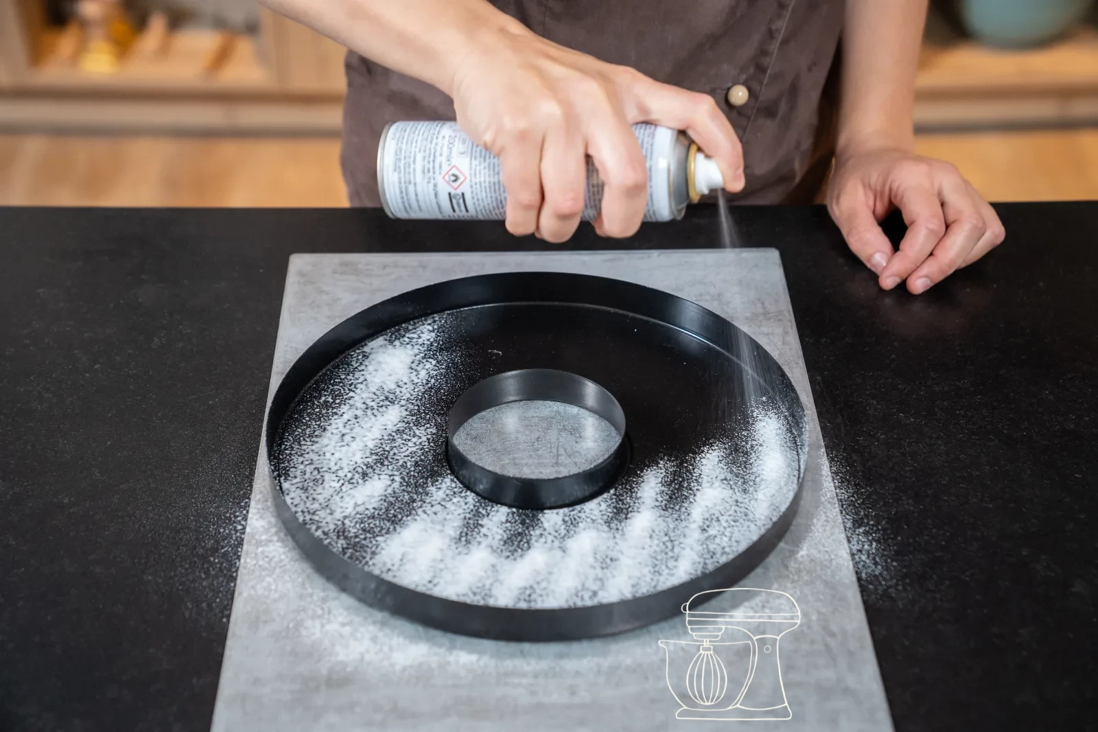 Lining the tin with the base