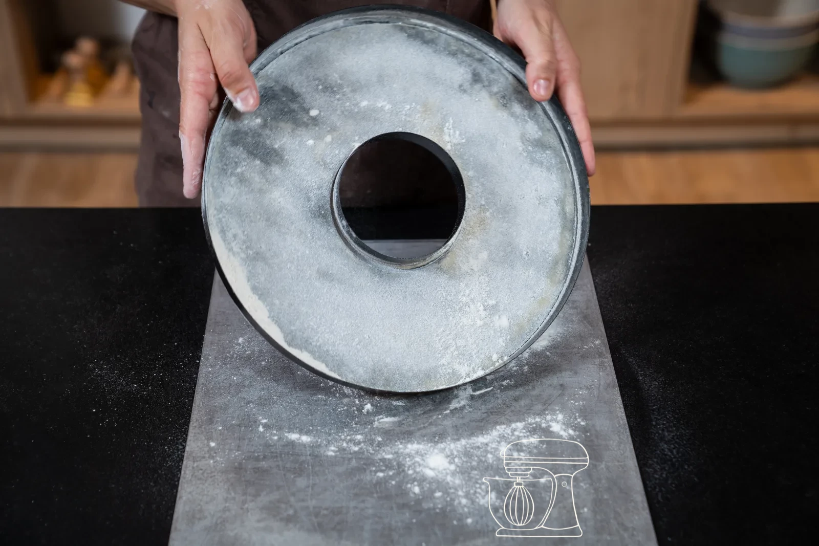 Lining the tin with the base
