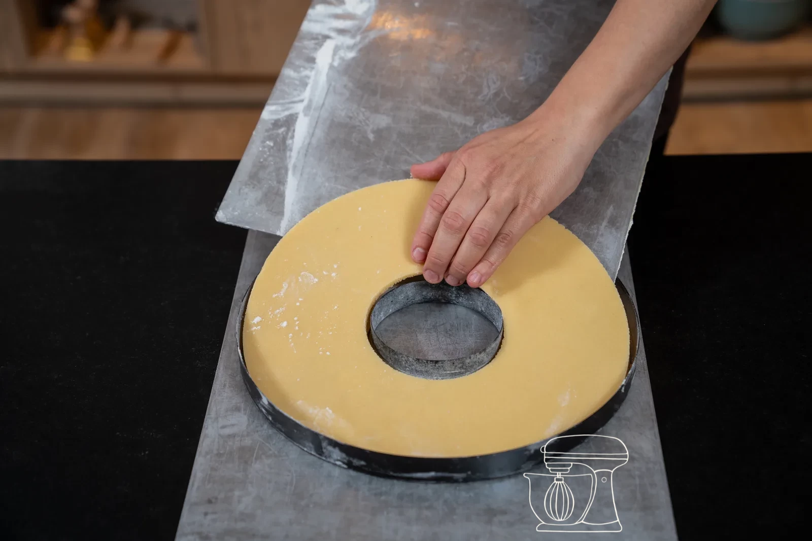 Lining the tin with the base