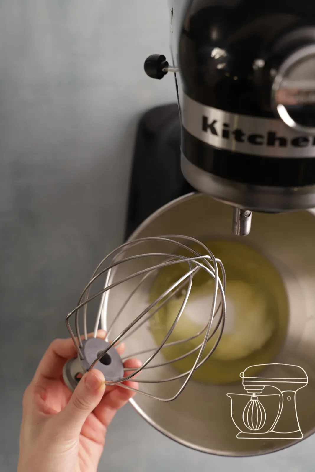 Egg white being whipped stiff with sugar and salt