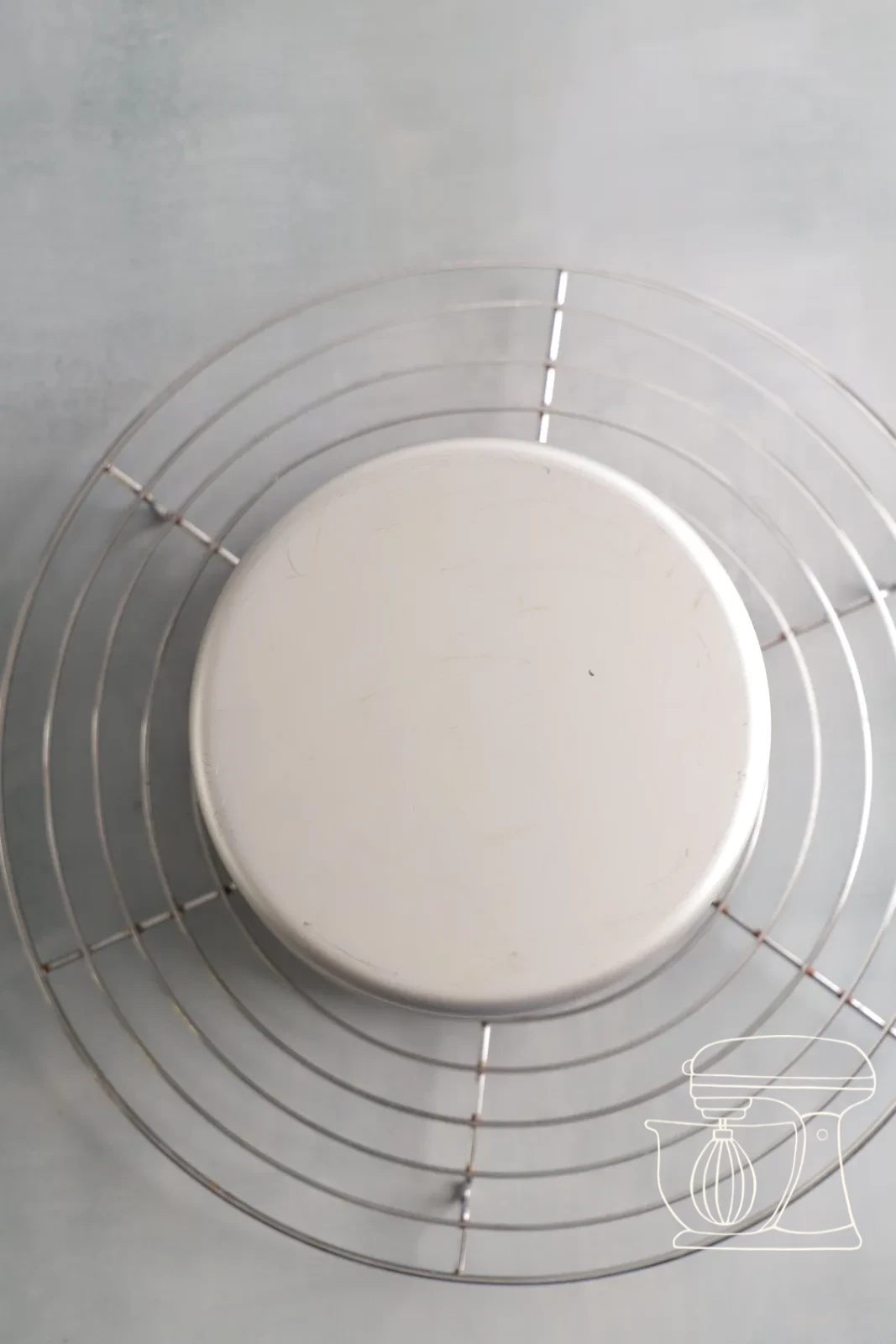 The sponge is turned out onto the Cake rack