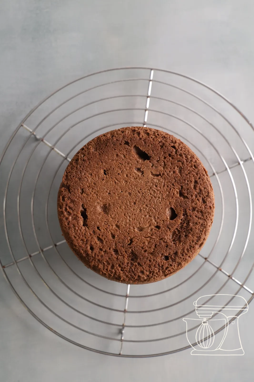 The sponge is turned out onto the Cake rack