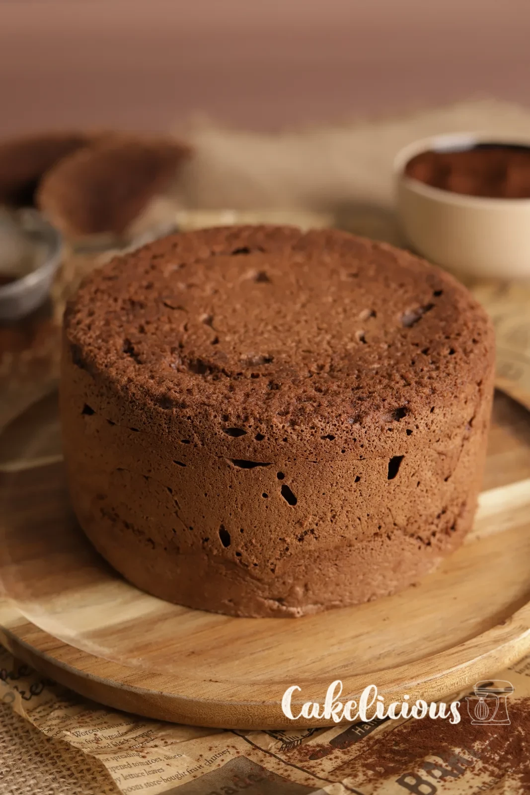 Chocolate sponge cake base, baked and turned out
