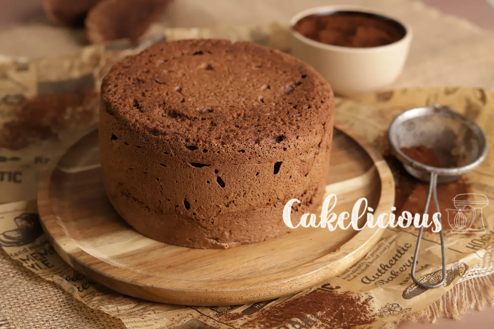 Chocolate sponge cake base, baked and turned out