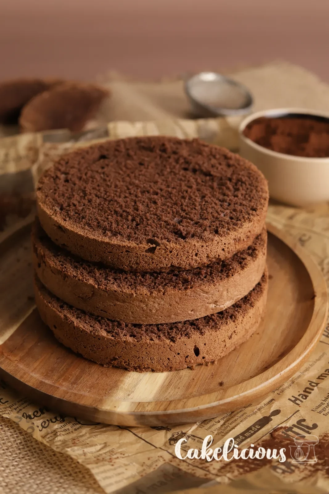 Chocolate sponge cake base, baked and turned out