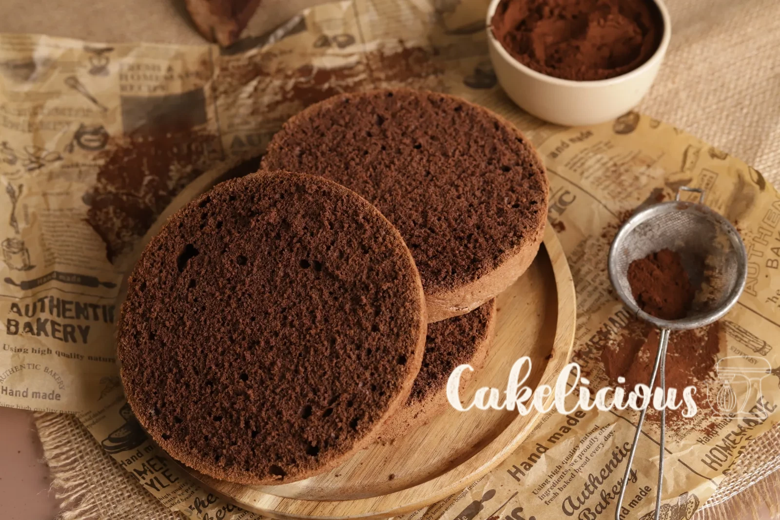 Chocolate sponge cake base, baked and turned out