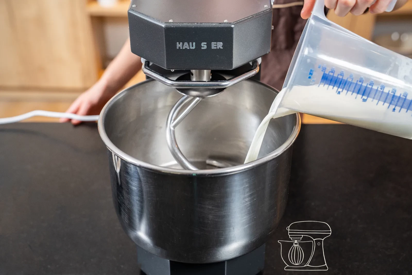 Flour, yeast, sugar and milk in the Mixing bowl