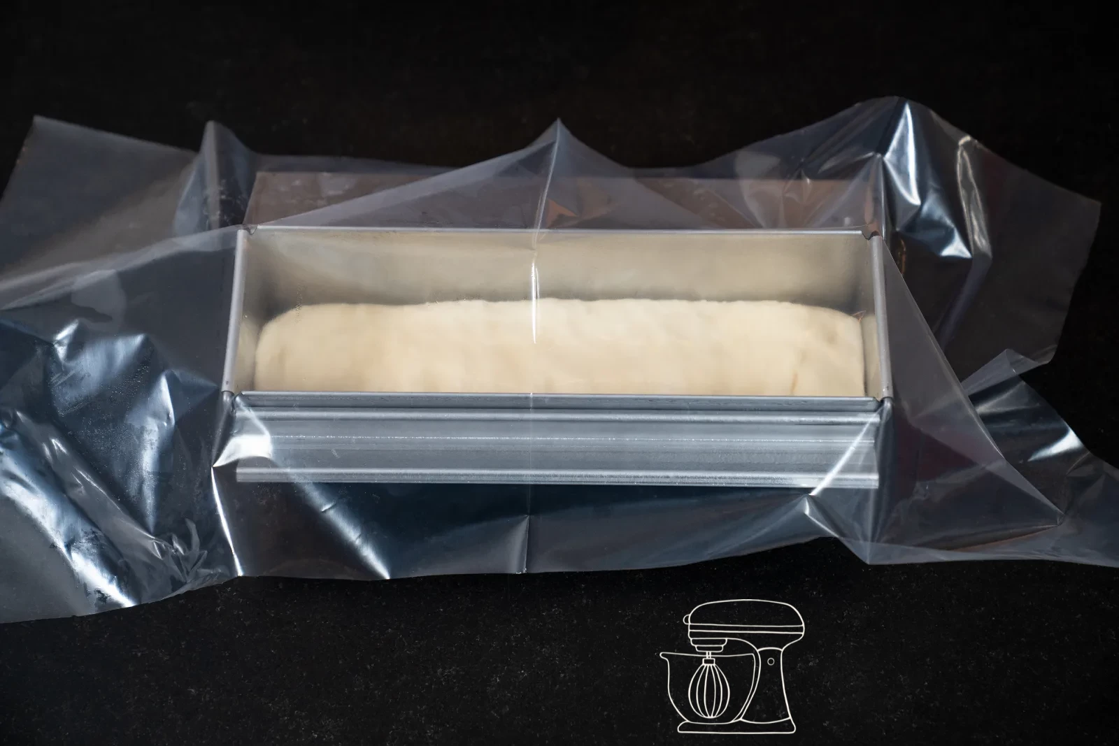 The tin is covered with a plastic pastry cloth