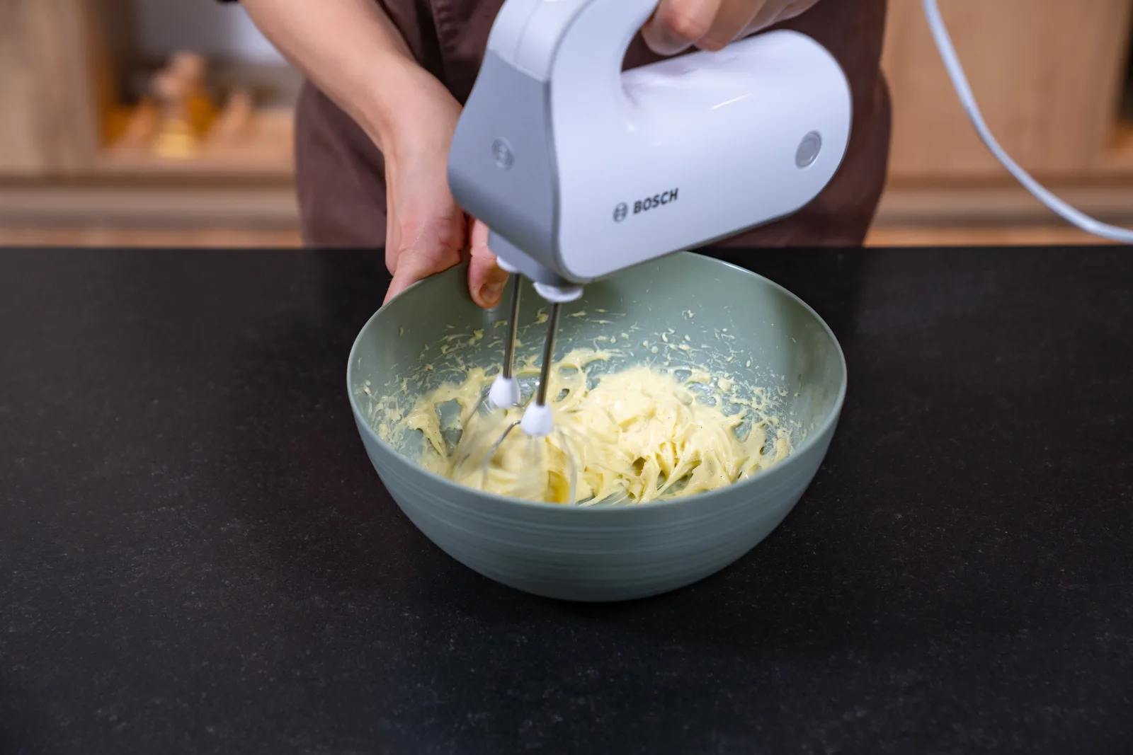 Smooth the cream and fold in the whipped cream